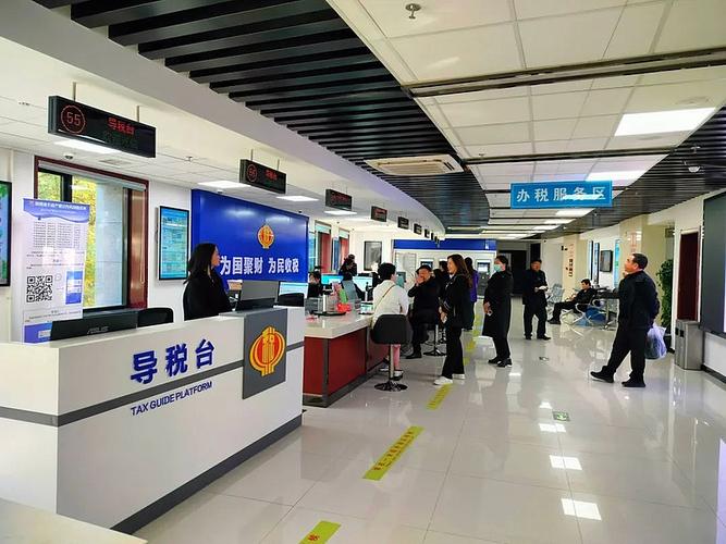 "以前办理不动产登记,首先需要到开发区的税务大厅办理契税业务,现在